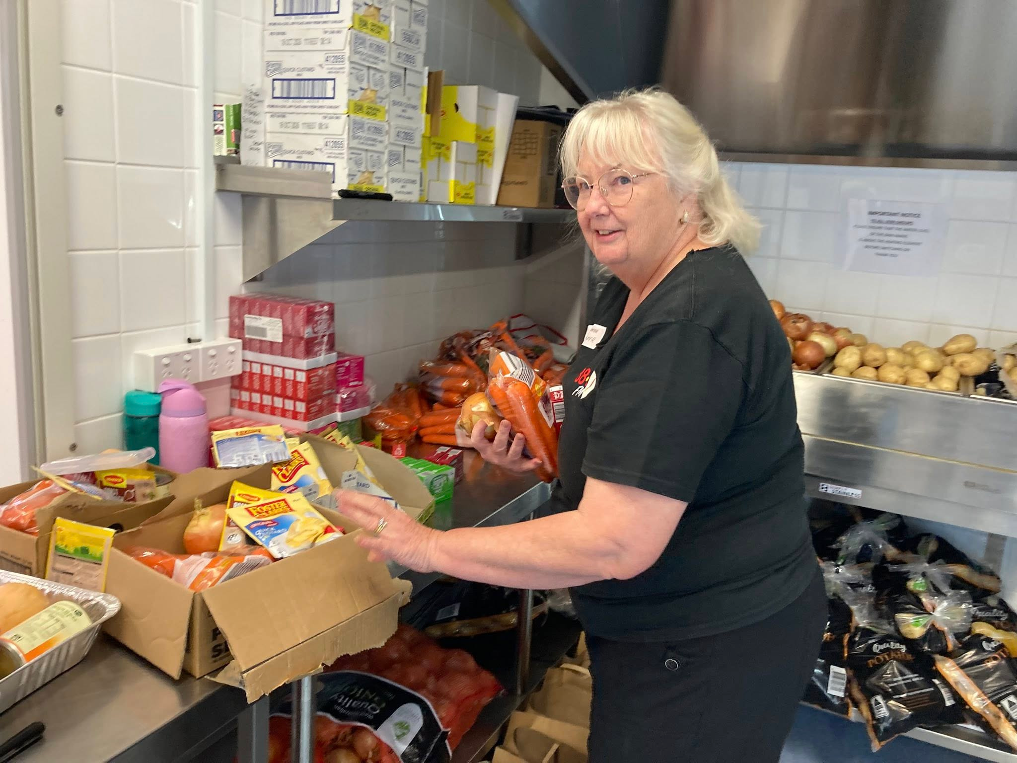 An aerial view of waves crashing against a shore.